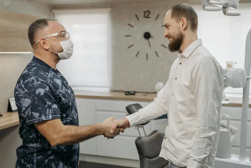 The Doctor Who Declared War on Handshakes—And Lost to American Politeness